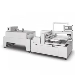Shrink wrapping machine