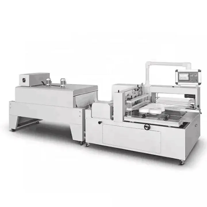 Shrink wrapping machine